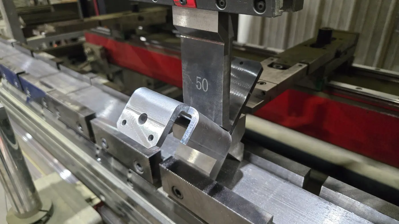 Press brake punch forming a small steel bracket